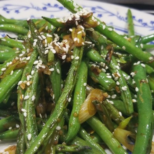 French Green Beans with liquid aminos rice wine vinegar garlic chili sauce and sesame seeds