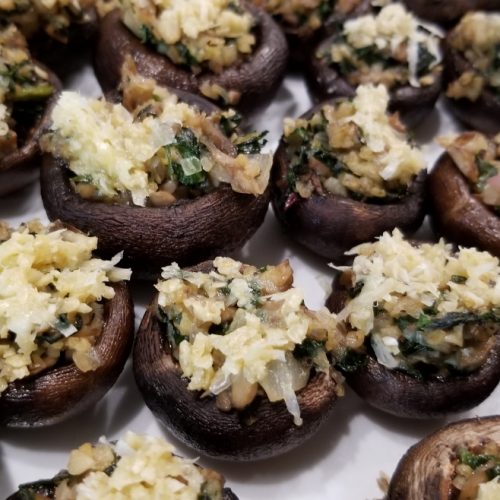 Stuffed mushrooms with pecorino romano, oat flour, garlic, shallots, and parsley